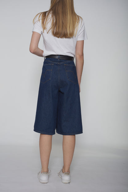 Baggy jean stone bleu foncé, coupe ample, en denim 100 % coton, avec taille mi-haute et style décontracté inspiré des années 90.